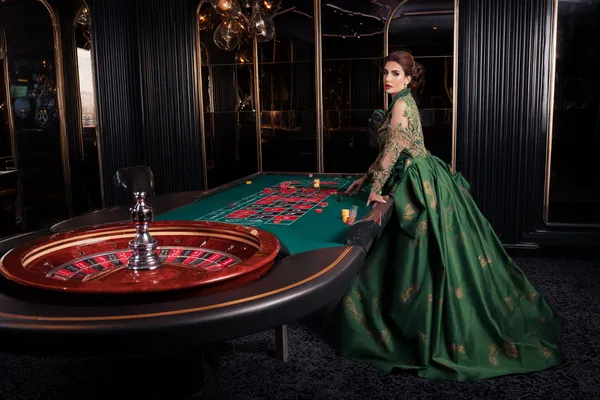 A glamorous woman holding casino chips in a neon-lit environment, representing the premium online casino atmosphere of JILI7978.