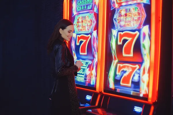 A woman in a luxurious green gown next to an ornate roulette wheel, capturing the upscale casino mood of JILI7978.